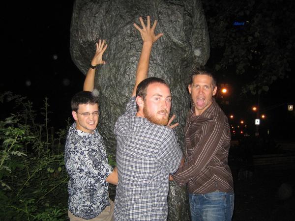 Dave, Trevor, and Trevor loving a tree