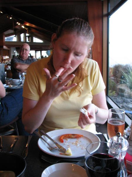 Wendy finishing a plate of seafood