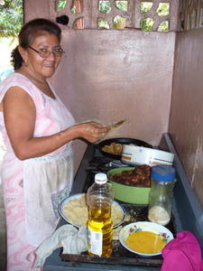 Mami cooking dinner