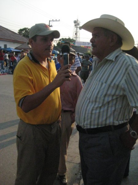 Grandpa getting interviewed at the fair
