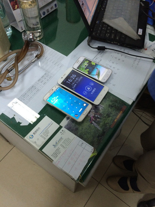 Dr. Meng's 3 cell phones for patient care this afternoon.