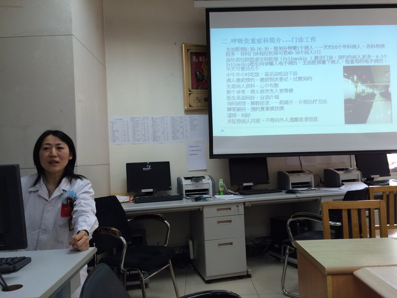 Dr. Aihong Meng presenting about her observership at KU Med