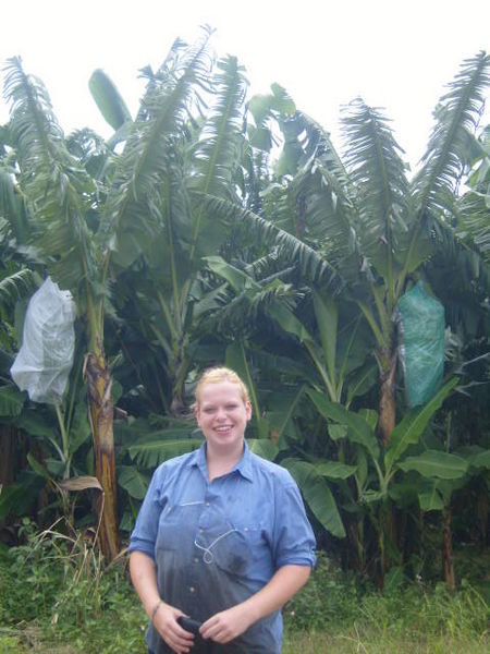 Me outside with the banana tree's