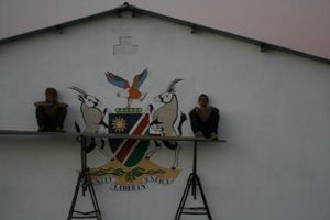 A2. Painting the Namibian Coat of Arms on the exterior wall