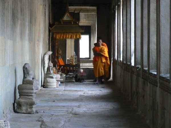 Monks in an inner gallery, Angkor Wat