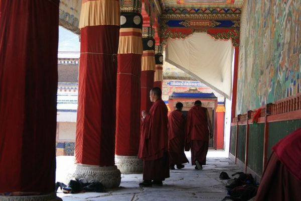 Monks coming out from prayer