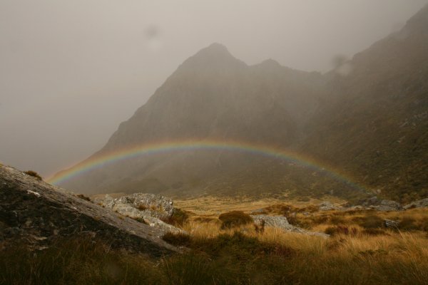 If you look hard enough you can always find a rainbow in horizontal hail. Pity about the pockmarks in your eyes though (Park Pass)