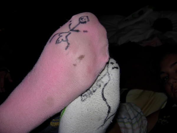 She drew a ghost on my sock while I was sleeping..