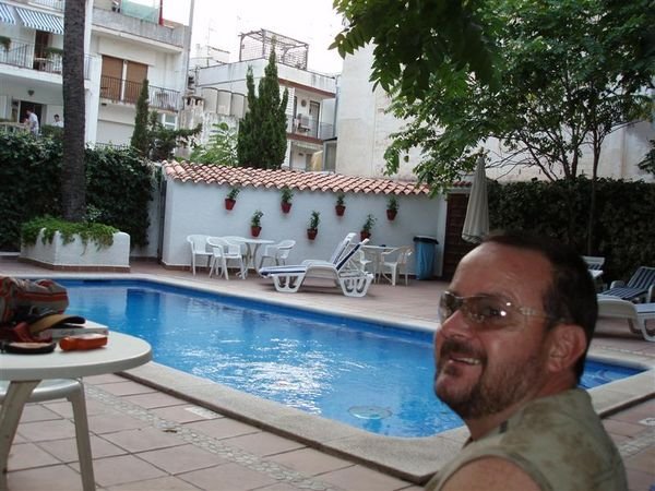 ian by pool in hotel