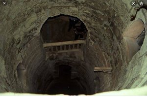 shaft where bodies were lowered into the tomb