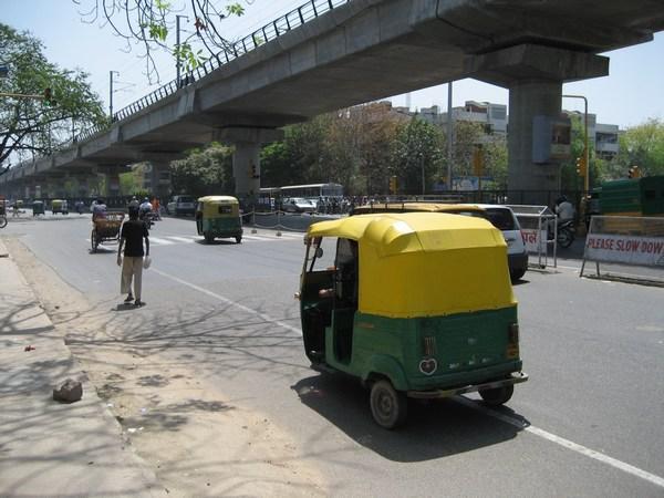 Auto-rickshaw zooms past