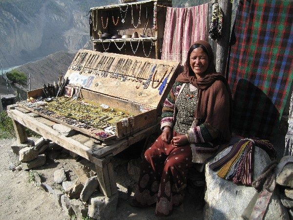 Tibetan woman selling trinkets