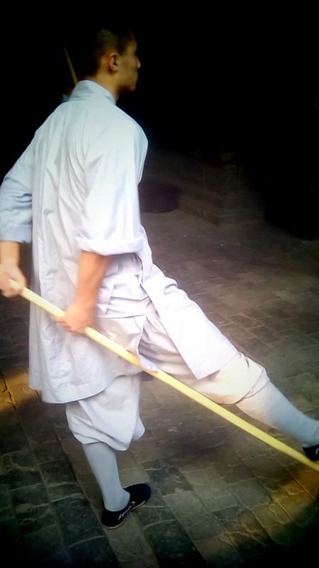A novice with the symbol of the Kung fu "The stick"