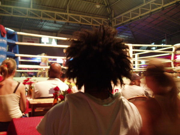 guys huge hair obscuring view of boxing