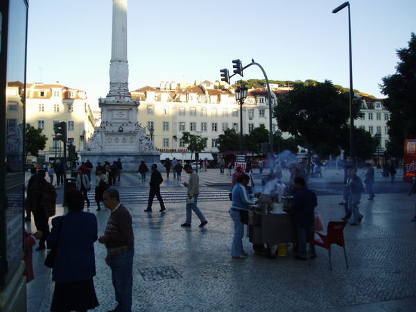 Praco Rossio - a street vendor in the middle ground
