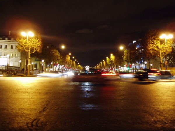 Looking down the Champ-Elysees at night