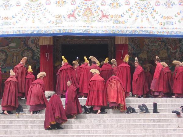 monks running for the morning cermony