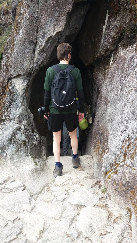 Martin descending into an Inca tunnel