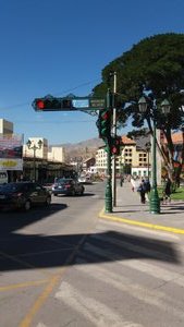 Street scene in Cusco showing traffic lights