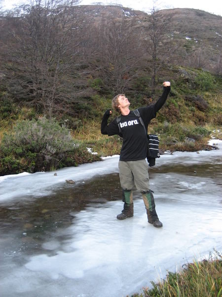 Drew stiking his hero pose on the frozen lake