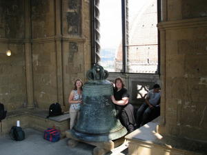 aj and nicole in front of bell at top