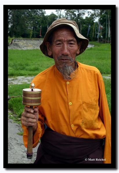 A monk with prayer wheel