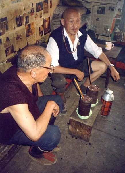 Drinking Tongba (Local Drink)