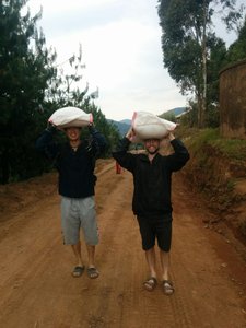 carrying rice on our heads like locals