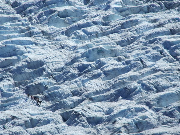 People on the huge glacier