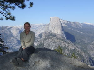Sam sat next to the distant Half Dome