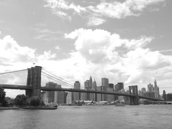 Brooklyn Bridge in front of the Manhattan Skyline