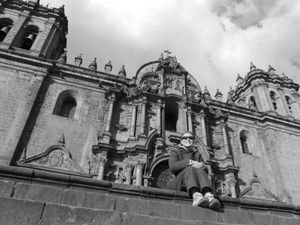 Sat on the steps of the cathedral in the Plaza de Armas - Cuzco