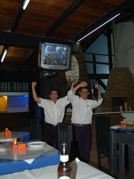 Waiters celebrate Brazil's goal