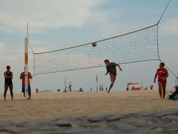 Adults playing on Copacabana beach