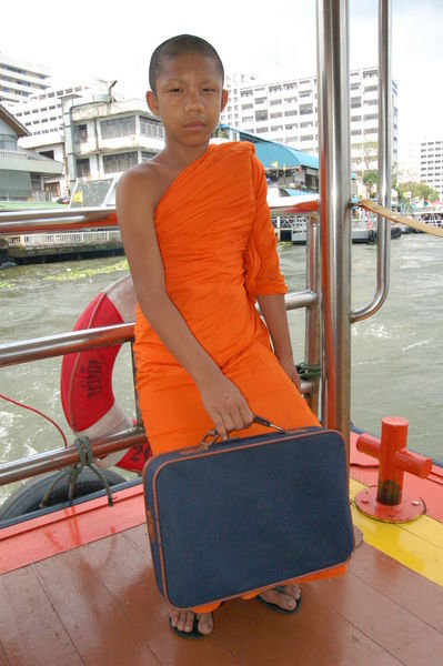 Novice monk on the ferry, Bangkok