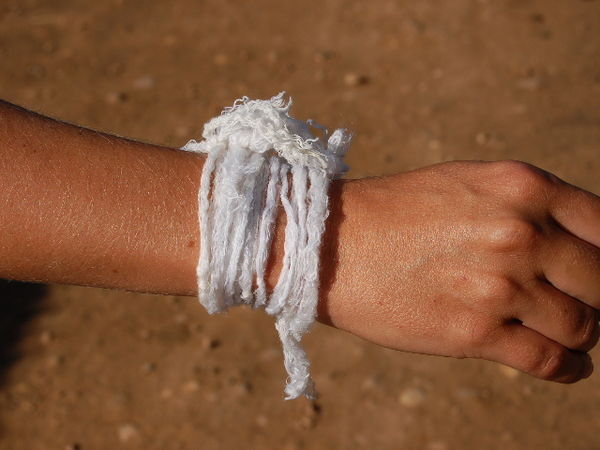 [i]Bacii[/i] cotton tied around my wrist