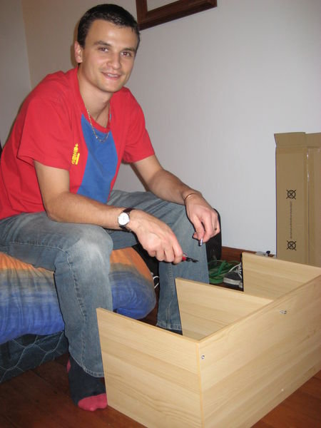 Nick assembles a piece of furniture