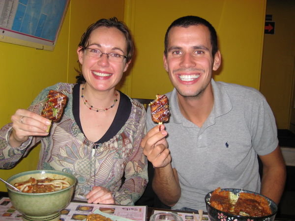Paula and John enjoy Japanese pizza lollies