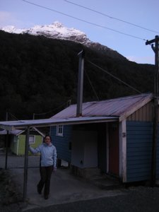 Paula outside our cabin, Gunns Camp, South Island