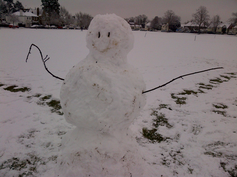 Snowman on the village green