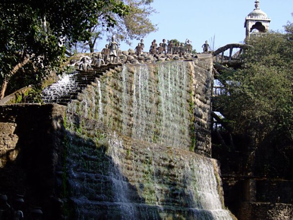 Villagers at waterfall