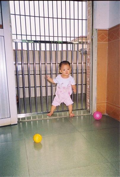 Maya in her dormitory at the orphanage weeks before being adopted