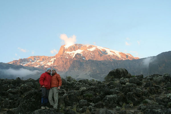 Posing in front of Kilimanjaro after the cloud cleared #2