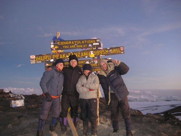 Kat, Simon, Brigid and Whitley at Uhuru Peak