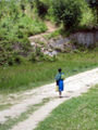 Schoolgirl walking in Kibuye
