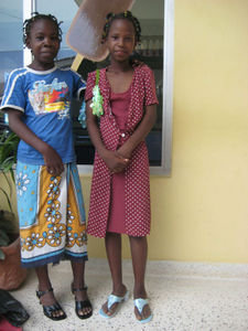 Bahati and Rosie with their new shoes and bags