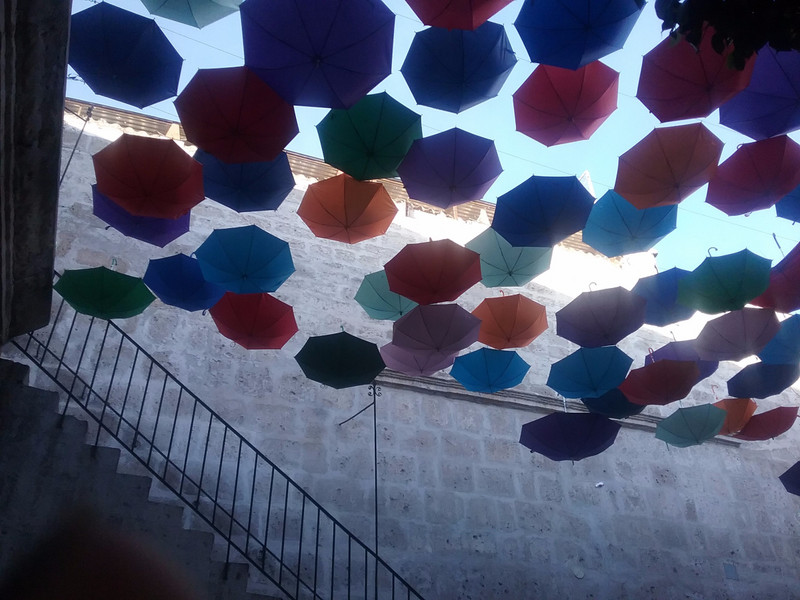 A ceiling of suspended umbrellas!