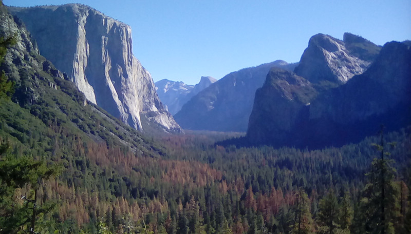 View of El Capitan left and Half Dome in distance