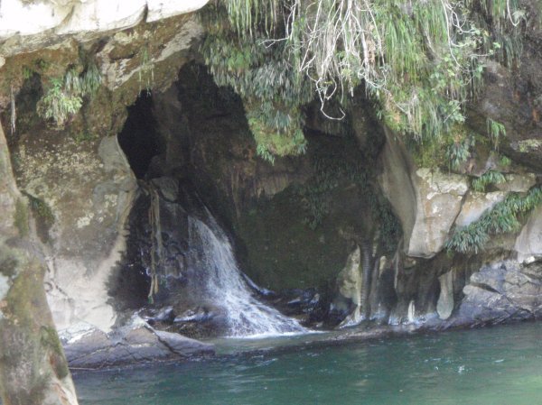 river coming out of cave