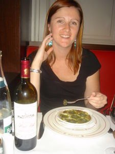 A tasty meal of escargot and red wine